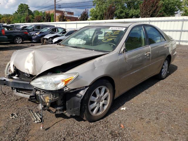 TOYOTA CAMRY LE 2003 with VIN 4T1BF32K73U544057 - Photo from auction