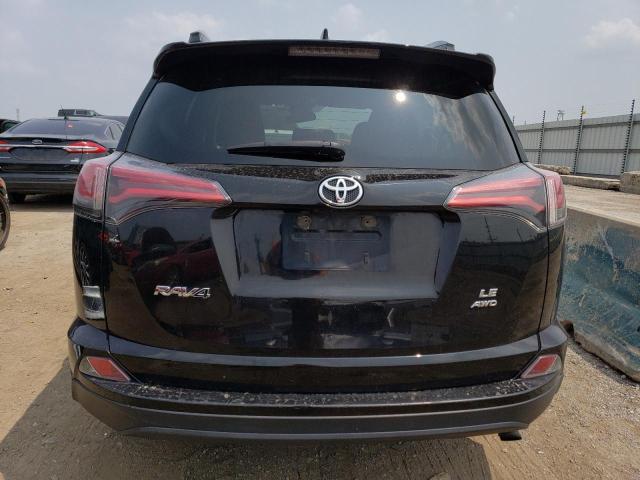 Photo 6 from auction – 2018 TOYOTA RAV4 LE with VIN 2T3BFREV9JW819313