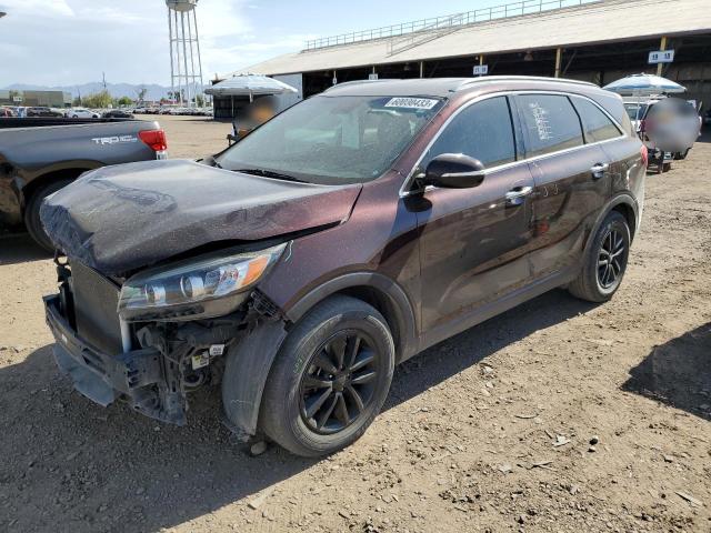 KIA SORENTO LX 2016 with VIN 5XYPG4A31GG022510 - Photo from auction