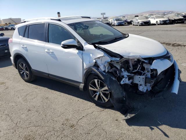 Photo 4 from auction – 2016 TOYOTA RAV4 XLE with VIN 2T3WFREV1GW304879
