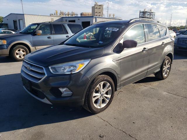 FORD ESCAPE SE 2018 with VIN 1FMCU0GD7JUA54105 - Photo from auction