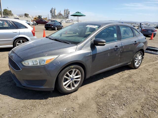 FORD FOCUS SE 2015 with VIN 1FADP3F27FL275448 - Photo from auction