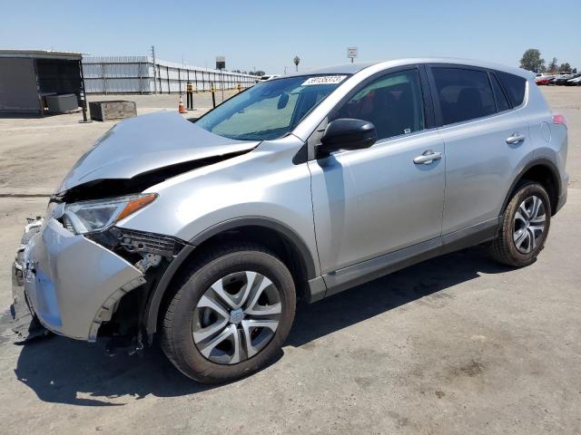 TOYOTA RAV4 LE 2018 with VIN JTMZFREV9JJ166284 - Photo from auction