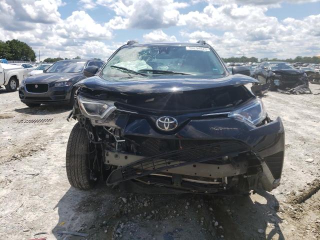 Photo 5 from auction – 2018 TOYOTA RAV4 LE with VIN 2T3ZFREV5JW431512
