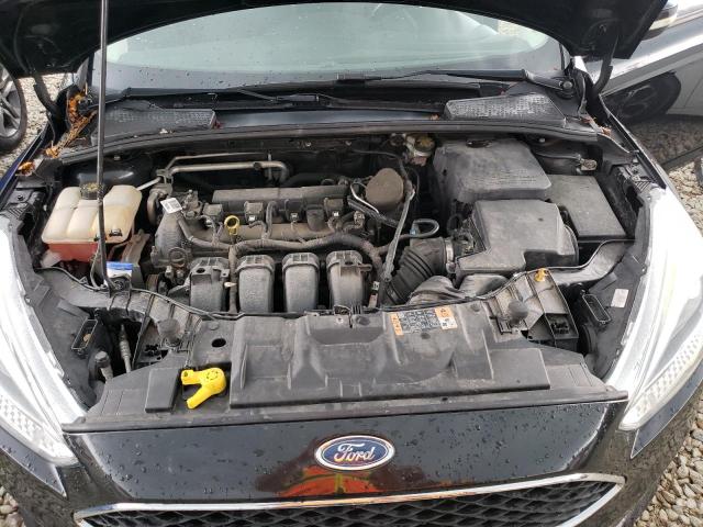 Photo 11 from auction – 2015 FORD FOCUS SE with VIN 1FADP3K21FL235307