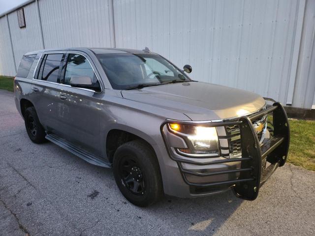 CHEVROLET TAHOE POLI 2018 with VIN 1GNLCDEC8JR280396 - Photo from auction