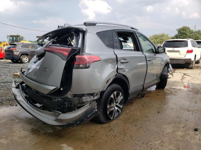 Photo 3 from auction – 2018 TOYOTA RAV4 LE with VIN JTMBFREV6JJ198465