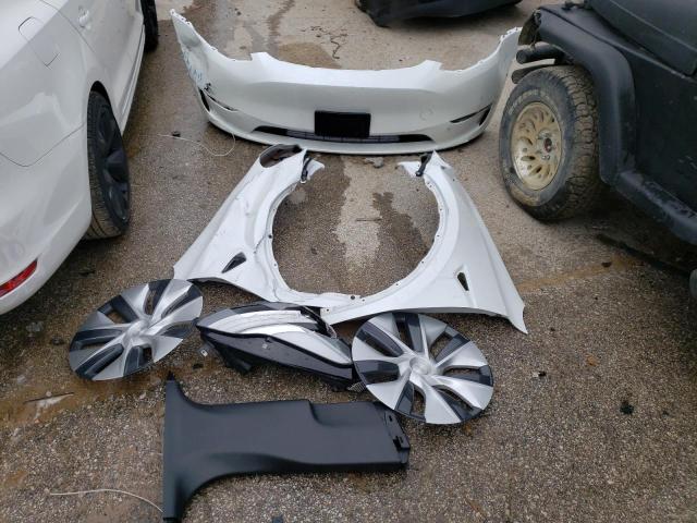 Photo 12 from auction – 2021 TESLA MODEL Y with VIN 5YJYGDEE2MF253029