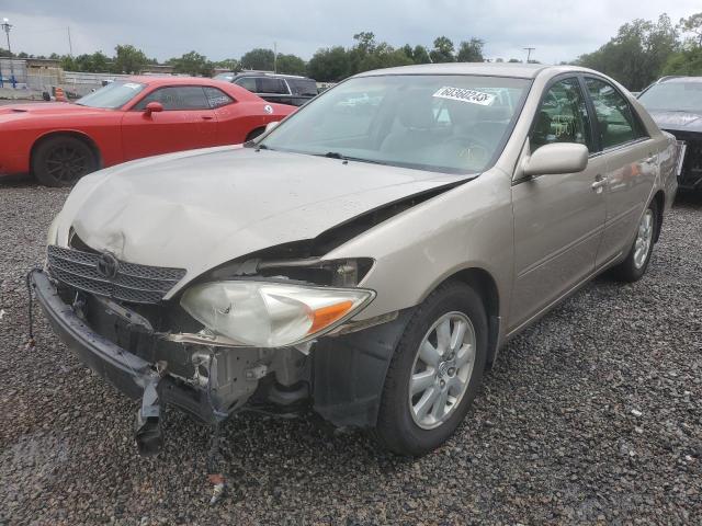 TOYOTA CAMRY LE 2003 with VIN 4T1BE32K03U191034 - Photo from auction