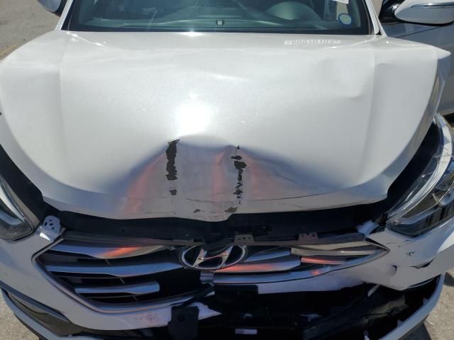 Photo 12 from auction – 2018 HYUNDAI SANTA FE S with VIN 5NMZU3LB6JH082036