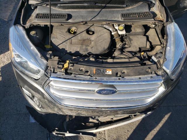 Foto 12 de la subasta – 2017 FORD ESCAPE TIT con VIN 1FMCU9J98HUC11563