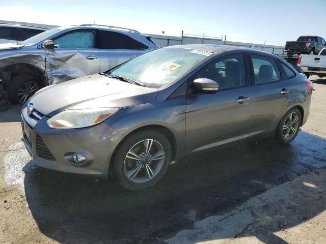 FORD FOCUS SE 2014 with VIN 1FADP3F23EL237598 - Photo from auction