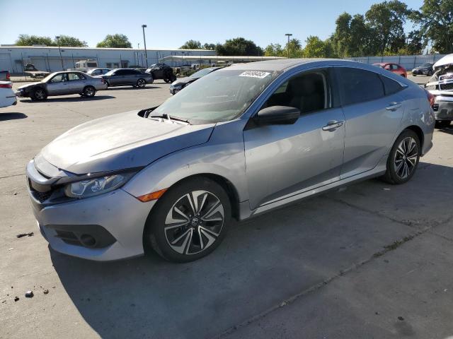 HONDA CIVIC EX 2016 with VIN 2HGFC1F34GH638753 - Photo from auction
