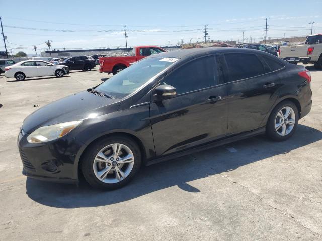 FORD FOCUS SE 2014 with VIN 1FADP3F20EL211024 - Photo from auction