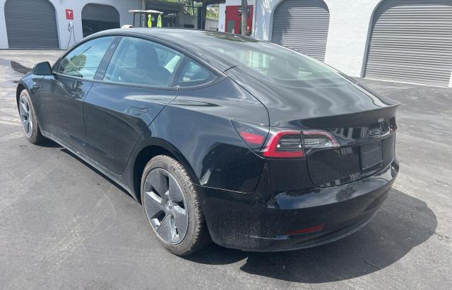 Photo 3 from auction – 2022 TESLA MODEL 3 with VIN 5YJ3E1EA7NF288856