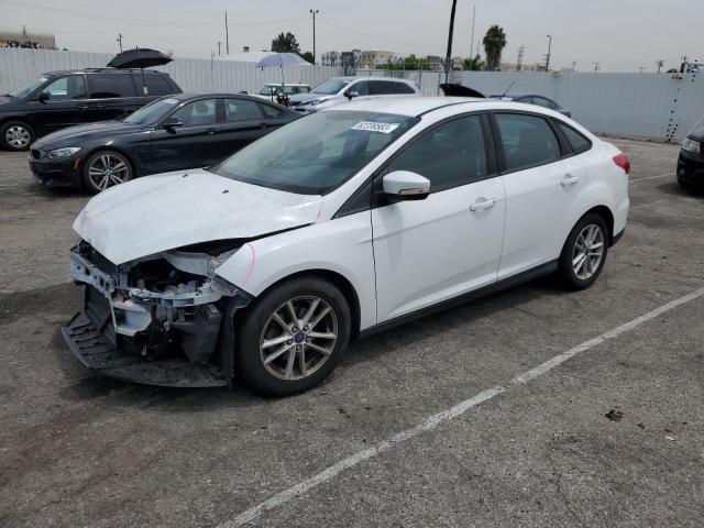 FORD FOCUS SE 2015 with VIN 1FADP3F27FL221244 - Photo from auction