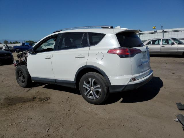 Photo 2 from auction – 2018 TOYOTA RAV4 LE with VIN JTMZFREV6JD112892