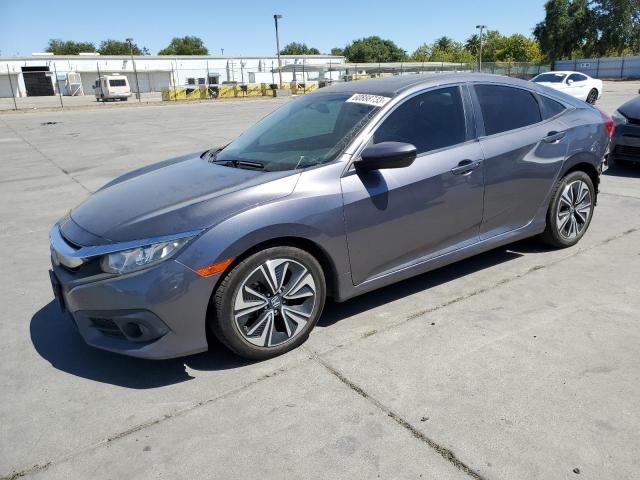 HONDA CIVIC EX 2017 with VIN 19XFC1F31HE202924 - Photo from auction