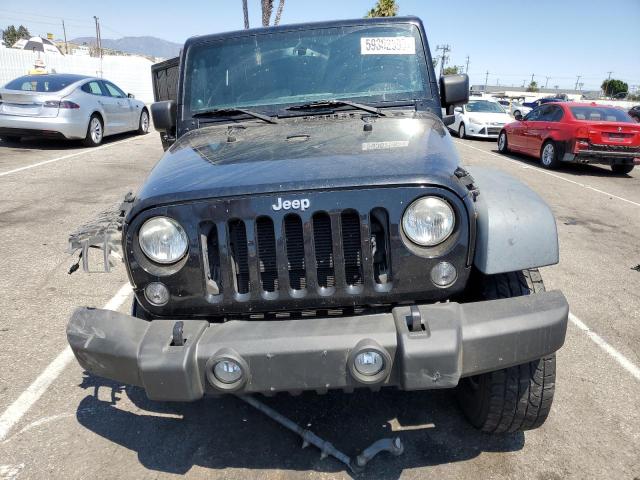 Photo 5 from auction – 2014 JEEP WRANGLER U with VIN 1C4HJWFGXEL115041