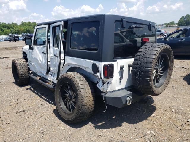 Photo 2 from auction – 2011 JEEP WRANGLER U with VIN 1J4HA3H15BL586205