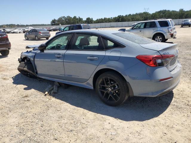 Photo 2 from auction – 2023 HONDA CIVIC SPOR with VIN 2HGFE2F53PH522896