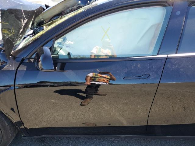 Photo 7 from auction – 2023 TESLA MODEL Y with VIN 7SAYGDEE2PF625895