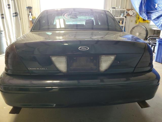 Foto 6 de la subasta – 2003 FORD CROWN VICT con VIN 2FAFP74W63X100421