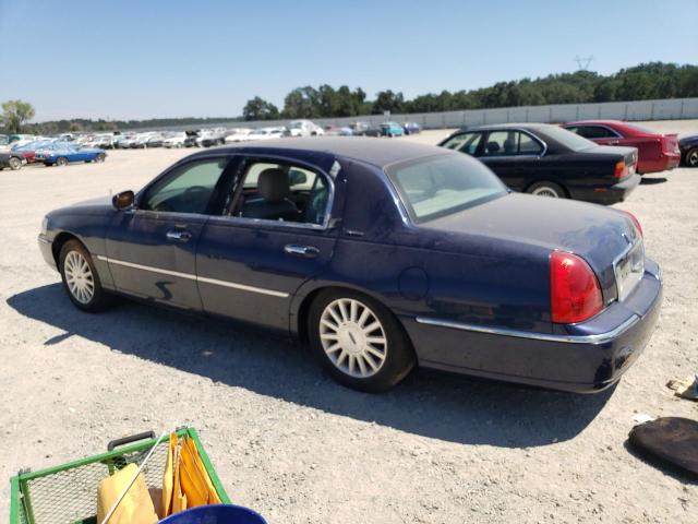 Photo 2 from auction – 2003 LINCOLN TOWN CAR E with VIN 1LNHM81W43Y638035