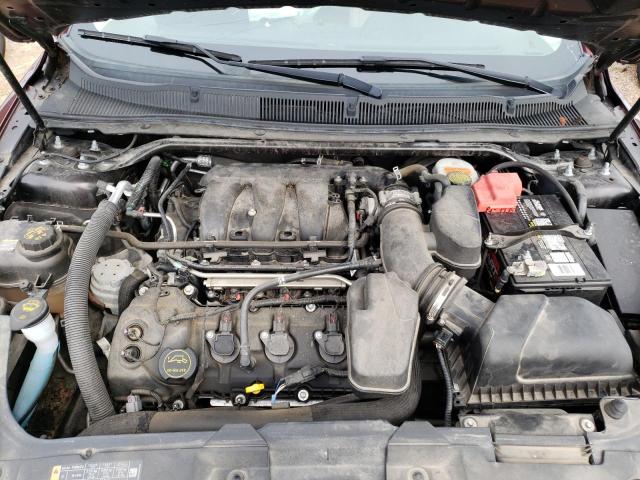 Photo 11 from auction – 2015 FORD TAURUS SEL with VIN 1FAHP2E8XFG143827