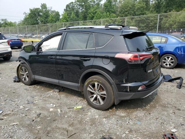 Photo 2 from auction – 2017 TOYOTA RAV4 XLE with VIN 2T3RFREV0HW680133
