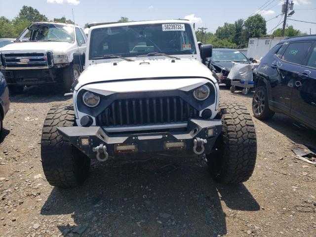 Photo 5 from auction – 2011 JEEP WRANGLER U with VIN 1J4HA3H15BL586205