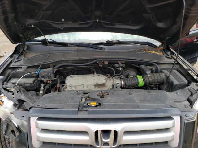Photo 12 from auction – 2006 HONDA PILOT EX with VIN 2HKYF18756H521977