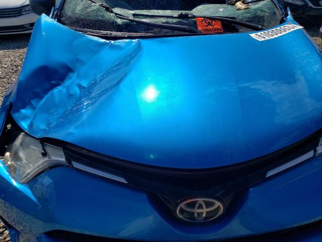 Photo 11 from auction – 2018 TOYOTA RAV4 LE with VIN 2T3BFREV5JW728393