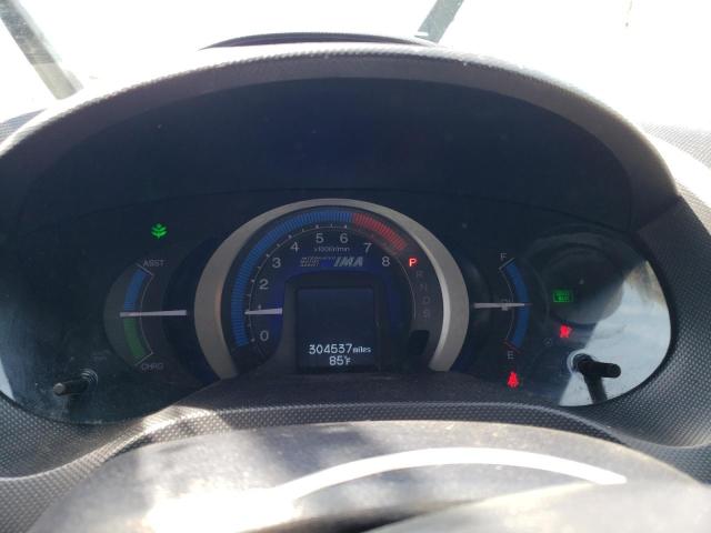 Photo 9 from auction – 2010 HONDA INSIGHT EX with VIN JHMZE2H7XAS025983