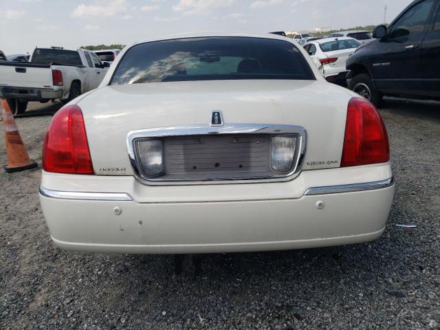 Photo 6 from auction – 2004 LINCOLN TOWN CAR U with VIN 1LNHM83WX4Y682247