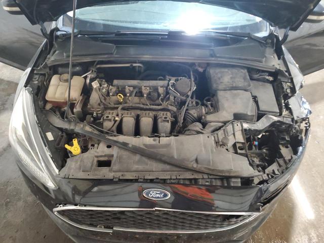Photo 11 from auction – 2015 FORD FOCUS SE with VIN 1FADP3K29FL267258