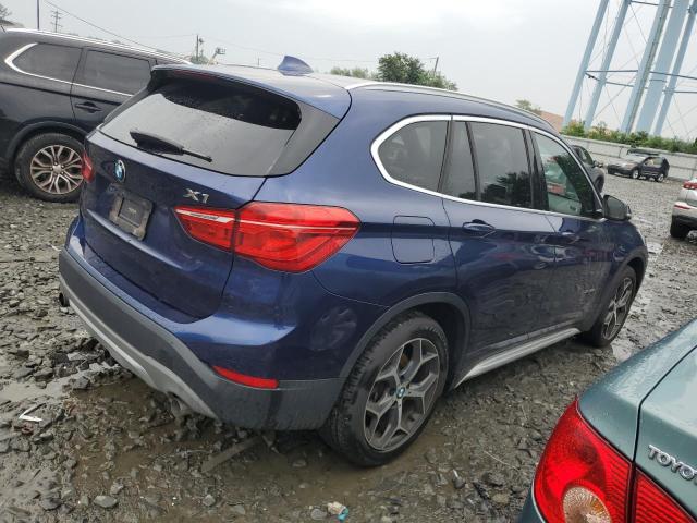 Photo 3 from auction – 2018 BMW X1 XDRIVE2 with VIN WBXHT3C35J5K23028