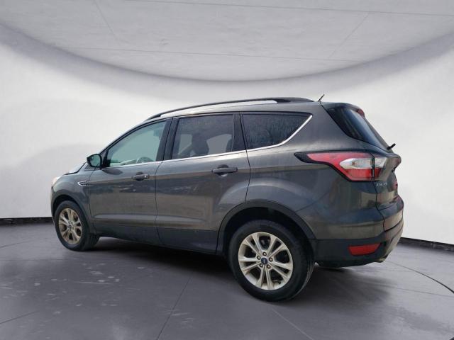 Photo 2 from auction – 2018 FORD ESCAPE SE with VIN 1FMCU0GD8JUC87409