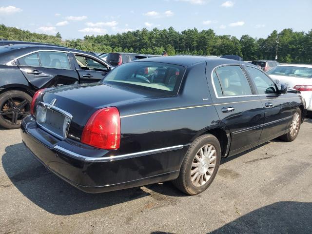 Photo 3 from auction – 2004 LINCOLN TOWN CAR U with VIN 1LNHM83W74Y670699