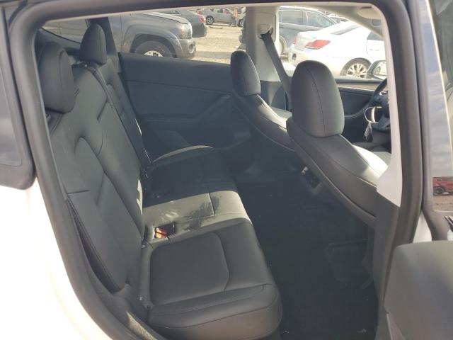 Photo 10 from auction – 2023 TESLA MODEL Y with VIN 7SAYGDEE3PA052728