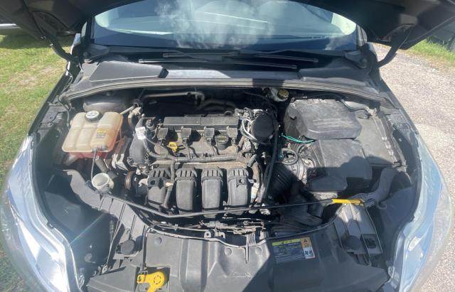Photo 7 from auction – 2012 FORD FOCUS SEL with VIN 1FAHP3M28CL390351