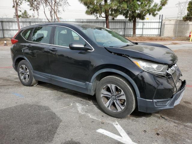 Photo 4 from auction – 2017 HONDA CR-V LX with VIN 7FARW5H31HE001077