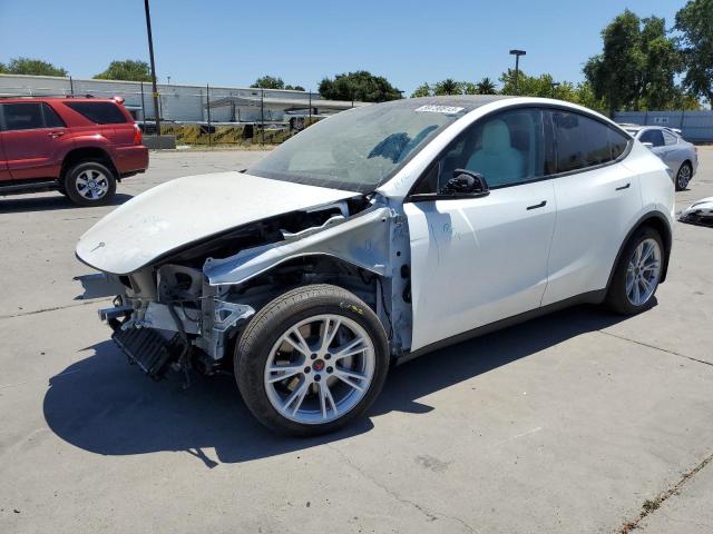 TESLA MODEL Y 2022 with VIN 7SAYGAEE1NF362309 - Photo from auction
