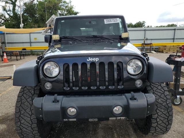 Photo 5 from auction – 2015 JEEP WRANGLER U with VIN 1C4BJWDG2FL604804