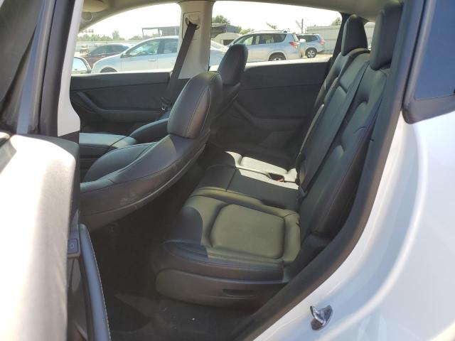 Photo 11 from auction – 2021 TESLA MODEL Y with VIN 5YJYGAEE5MF297475