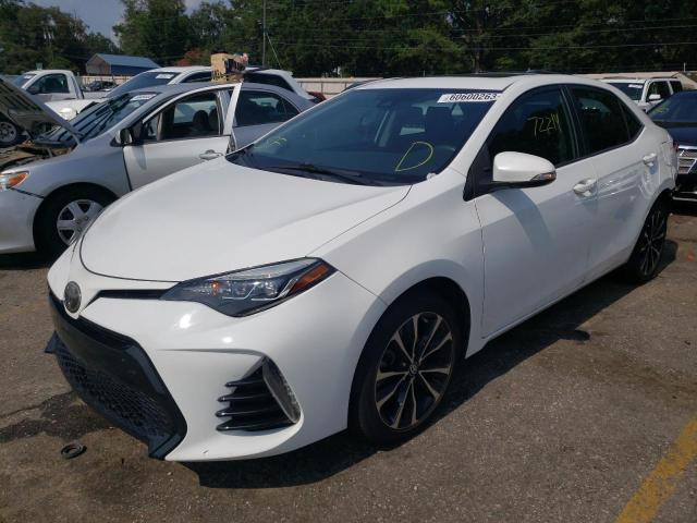 TOYOTA COROLLA L 2018 with VIN 5YFBURHE1JP771303 - Photo from auction