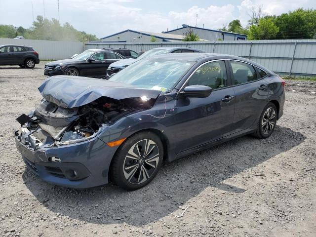 HONDA CIVIC EX 2018 with VIN JHMFC1F34JX037438 - Photo from auction