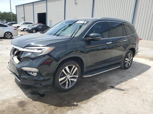 Photo 1 from auction – 2016 HONDA PILOT TOUR with VIN 5FNYF6H96GB122820