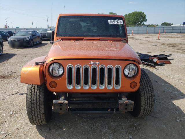 Photo 5 from auction – 2011 JEEP WRANGLER U with VIN 1J4BA5H16BL548225
