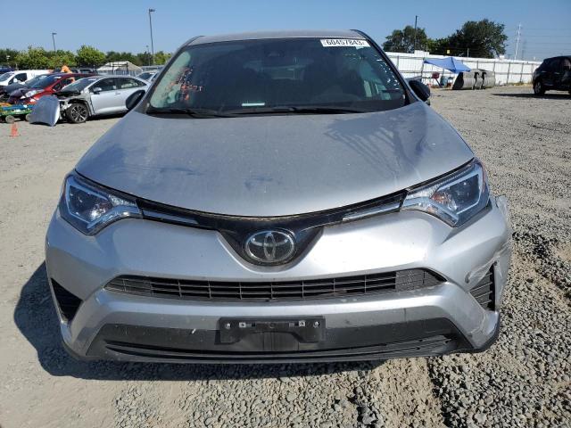 Photo 5 from auction – 2018 TOYOTA RAV4 LE with VIN 2T3ZFREV7JW475527
